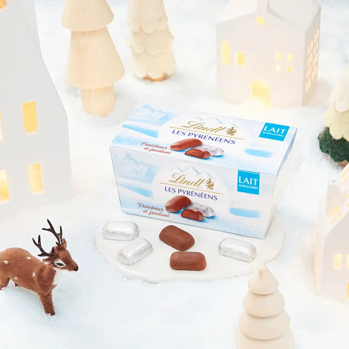 Celebrate the art of fine chocolate and bring home the irresistible flavor of Lindt Pyreneens Milk Chocolate this holiday season. Perfect for gifting or savoring with loved ones!