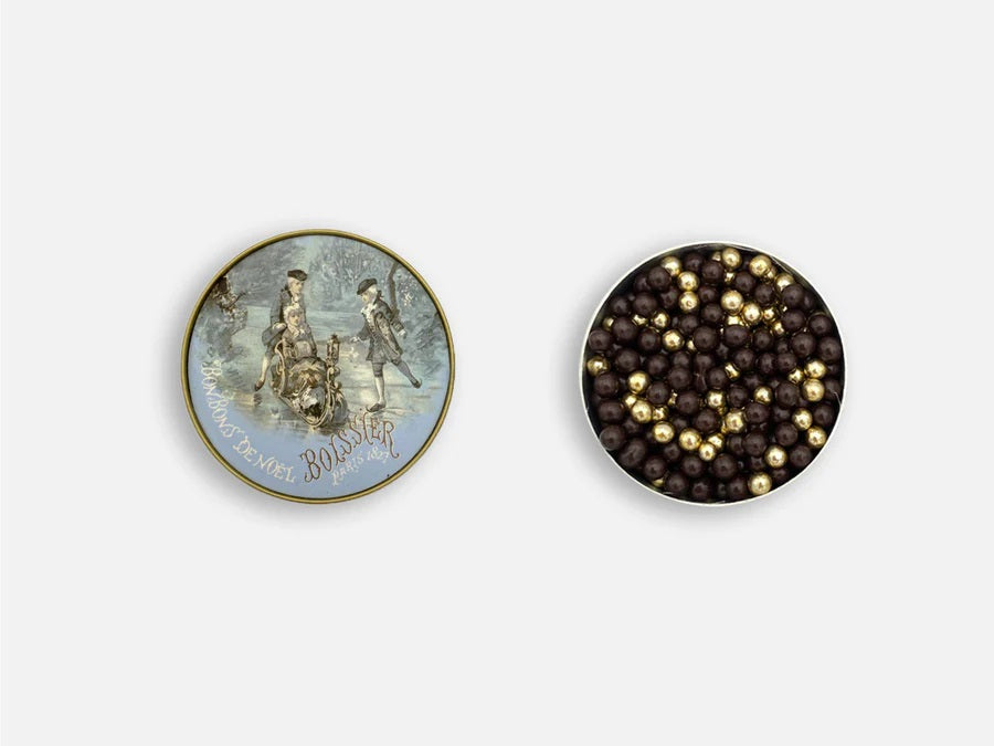 Experience the luxurious taste of Maison Boissier's Chocolate Pearls, presented in an elegant Christmas Powder Box. Perfect for gifting, these Parisian chocolates offer a blissful indulgence for any chocolate connoisseur.