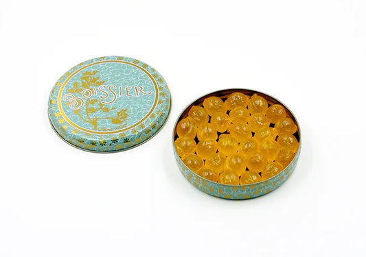 Discover the timeless elegance of Maison Boissier's iconic "Boule" Pineapple Hard Candy, now available in a convenient 70-gram tin. Crafted nearly 200 years ago by Bélisaire Boissier, these delectable pineapple-flavored candies have become a symbol of French confectionery excellence.