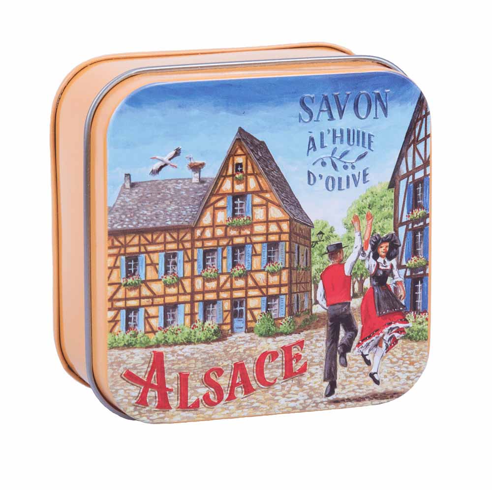 Immerse yourself in the charm of Alsace with La Savonnerie de Nyons' Cotton Flower Soap, beautifully packaged in a 'Village Alsacien' vintage tin. 