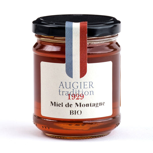 The aromas of the Augier Tradition Mountain Honey Bio, which is a polyfloral honey with a distinct personality, are determined by the location in which the honey was obtained. The color is brown with golden reflections, and it can go lighter at times.