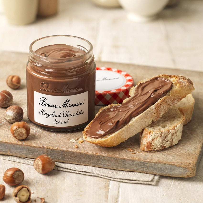 Bonne Maman Hazelnut Chocolate Spread also performs well when gently warmed as a pouring sauce over desserts, crèmes, or ice creams, spread between sponges or biscuits, and stirred into warm, frothy milk to make a homemade hot chocolate.