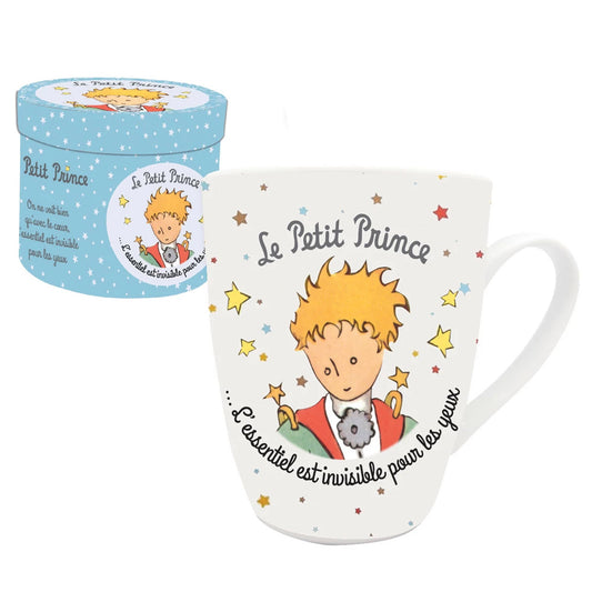 The Little Prince pretty gift box: the porcelain mug and the box depicting the Little Prince in his prince's coat. A quote is written on the mug and the box. Perfect for giving.